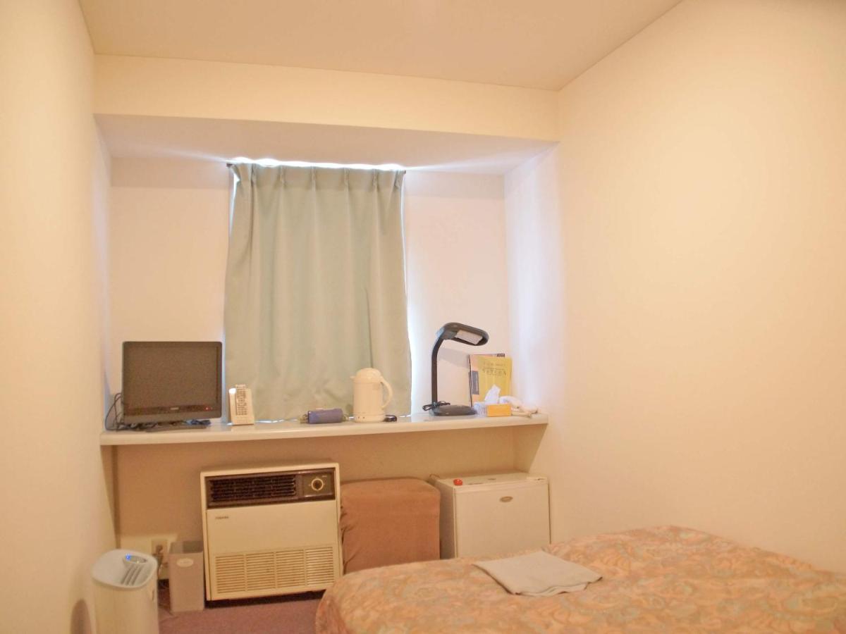 Business Hotel Chateau Est Takamacu Kültér fotó